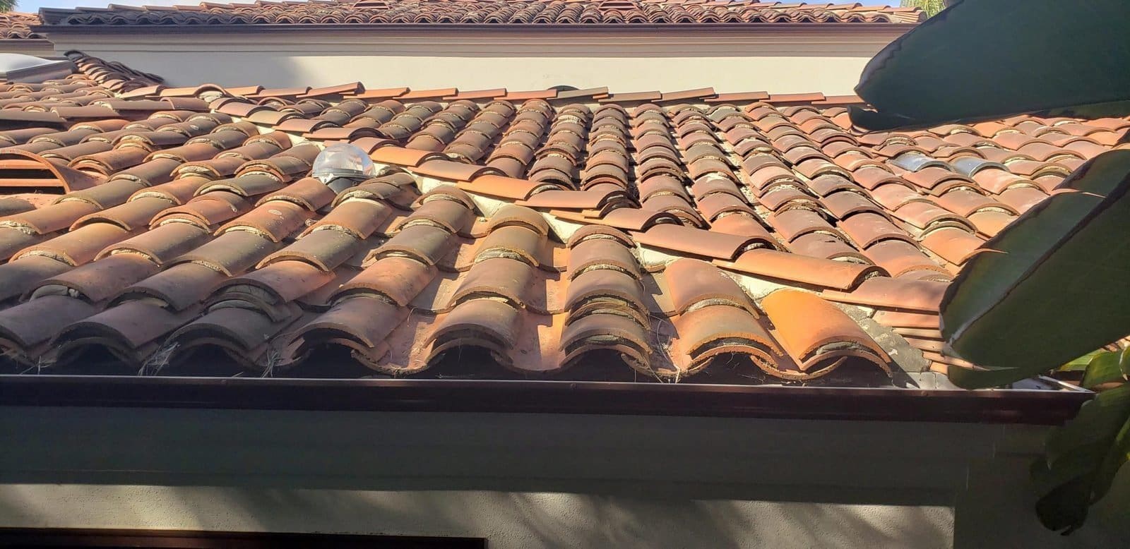 Clay tile roof inspection.