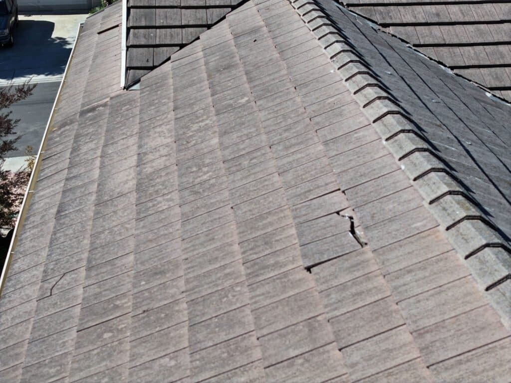Roof inspection shows broken tiles on roof. San Diego roofing inspection.