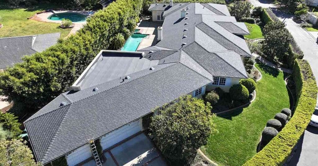 Roof Replacement with Owens Corning Duration Max Shingles. The original roof was medium wood shakes.