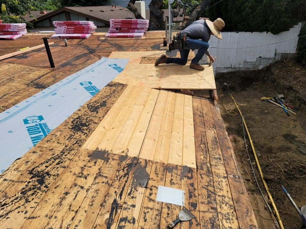 Fascia Replacement. Also in the image is shiplap and plywood replacement